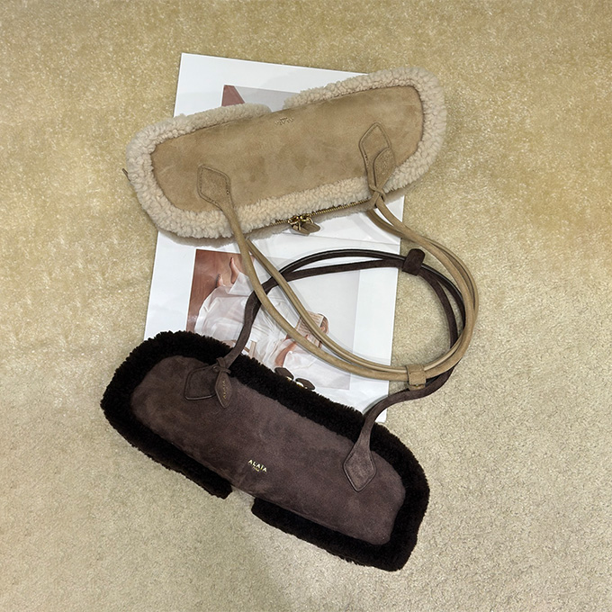alaïa le teckel shearling long barrel shoulder handbag